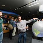 Graduate student Vince Agard demonstrating the iGlobe. Credit: John Gillooly