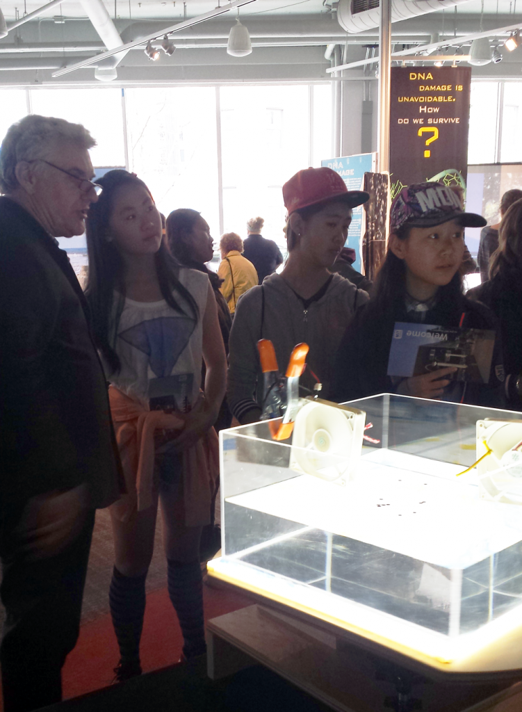 EAPS professor John Marshall demonstrates how trash in the Pacific Ocean becomes caught in a gyre. (Credit: Lauren Hinkel)
