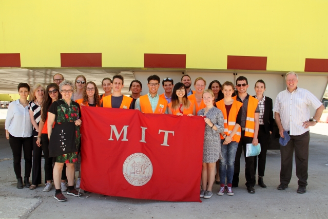 MIT students, students from the University of Venice, and faculty members from both institutions pose in front of Venice's experimental floodgates as part of a collaborative summer workshop. (Photo: Lily Keyes)