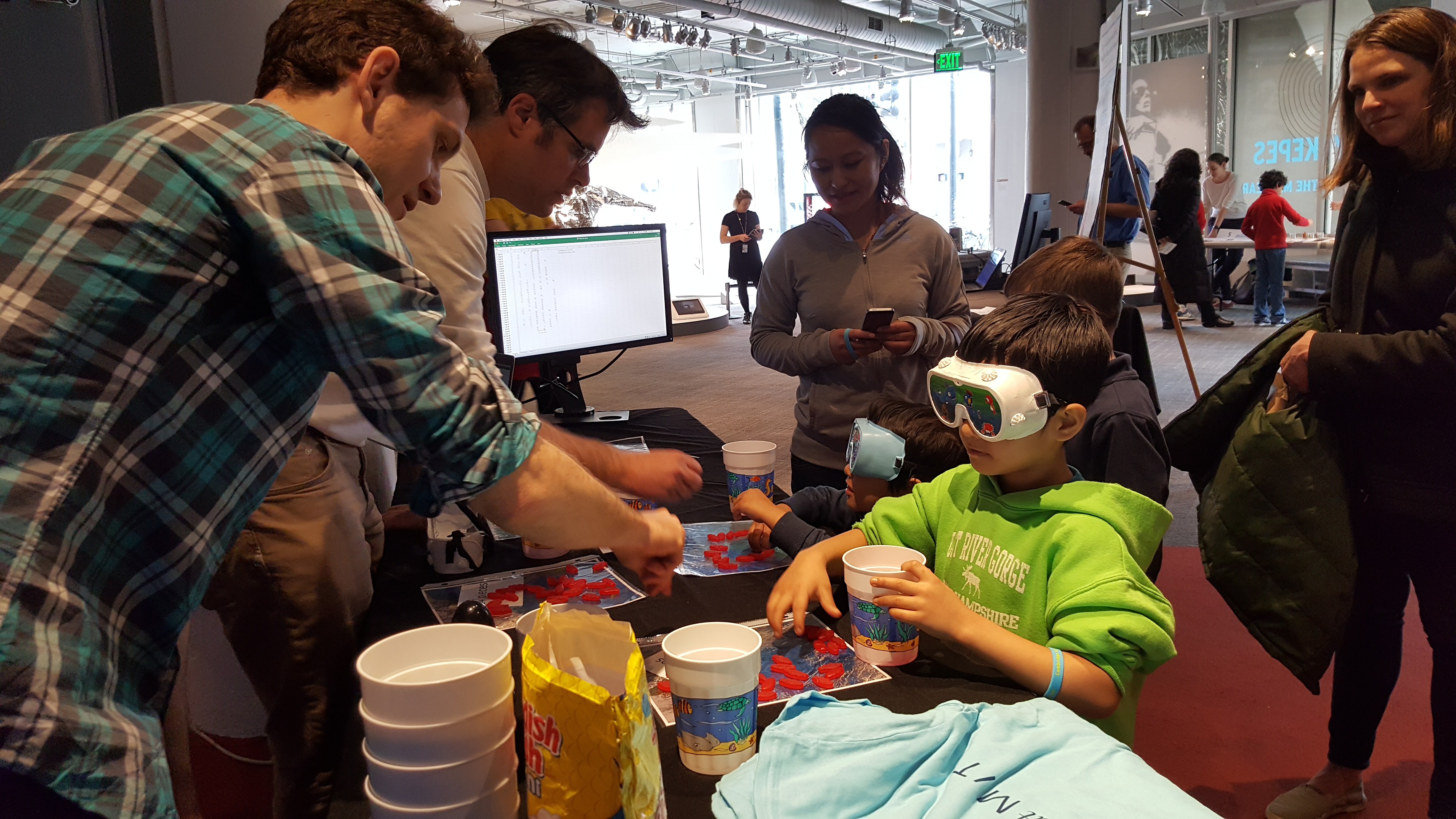 EAPS scientists Daniel Koll and AW Omta assist young ocean explorers. (Photo: Courtesy of Jonathan Lauderdale)