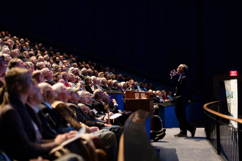A capacity crowd at the Omni Theater of the New England Aquarium enjoying the 2016 John Carlson Lecture "Big Ice: Antarctica, Greenland and Boston" given by Prof. Richard Alley. (Photo: John Gillooly)