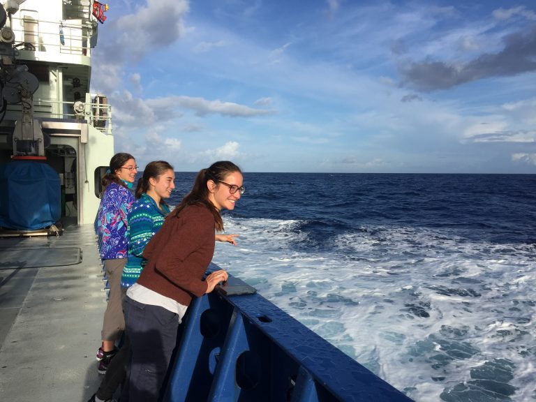 Happy graduate students on deck as we cross over the axial valley of the Mid-Atlantic Ridge. (Photo by J.-A. Olive.)