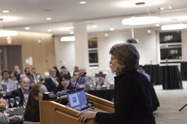 Institute Professor Sallie "Penny" Chisholm presents her research on Prochlorococcus to the CEE community — including alumni — at the CEE New Research Reception. (Photo: Alan Silfen)
